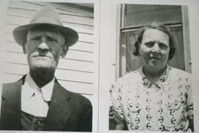 An Elderly Man With a Hat Standing With a Woman